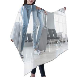 Personality  Partial View Of Couple Walking With Luggage In Airport  Hair Cutting Cape
