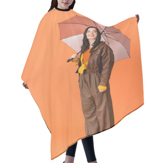 Personality  Full Length Of Joyful Woman In Autumn Outfit And Boots Standing With Umbrella On Orange Hair Cutting Cape