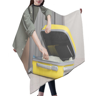 Personality  Partial View Of Young Tattooed Woman In Casual Clothes Unpacking Yellow Suitcase With Travel Necessities On Comfortable Bed In Modern Hotel Room Near Grey Curtains On Blurred Background Hair Cutting Cape