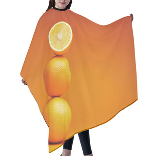 Personality  Close-up View Of Whole And Sliced Oranges On Orange Background  Hair Cutting Cape