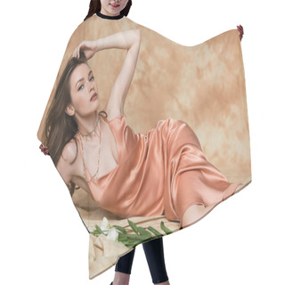 Personality  Seductive Young Woman With Brunette Hair Lying In Slip Dress On Linen Fabric Near Delicate White Flowers On Mottled Beige Background, Sensuality, Sophistication, Elegance, Eustoma, Looking At Camera Hair Cutting Cape