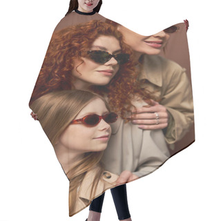 Personality  Portrait Of Happy Three Generations Of Women In Coats And Sunglasses Looking Away On Brown Backdrop Hair Cutting Cape