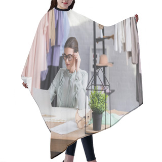 Personality  Seamstress Looking At Sketch Near Cloth And Sewing Machine  Hair Cutting Cape