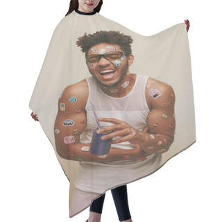 Personality  Excited African American Man With Stickers On Face And Body Holding Soda Can On Grey Background Hair Cutting Cape