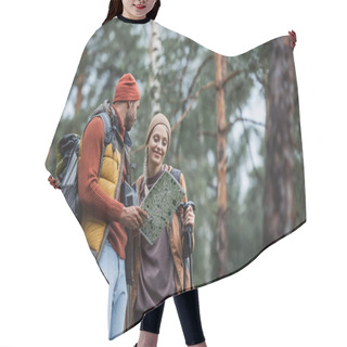 Personality  Man Holding Map And Looking At Cheerful Woman With Hiking Sticks Hair Cutting Cape
