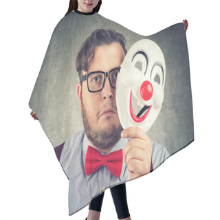 Personality  Young Bearded Man Holding Happy Mask Being Sad And Gloomy While Looking At Camera On Gray Background Hair Cutting Cape