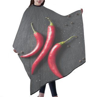 Personality  Top View Of Three Red Ripe Chili Peppers On Black Surface Hair Cutting Cape