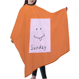Personality  Top View Of Paper With Sunday Lettering And Cheerful Smiley With Sticking Out Tongue On Orange Background Hair Cutting Cape