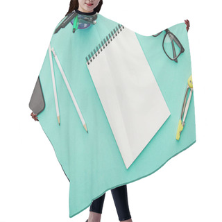 Personality  Top View Of Smartphone With Blank Screen Near Glasses, Stationery And Notebook Isolated On Turquoise Hair Cutting Cape