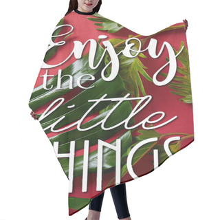 Personality  Top View Of Tropical Green Leaves On Red Background With Enjoy Little Things Illustration  Hair Cutting Cape