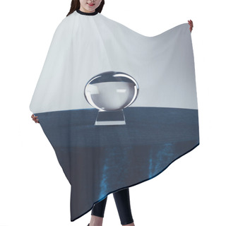 Personality  Crystal Ball On Round Table With Dark Blue Tablecloth On Grey Background Hair Cutting Cape