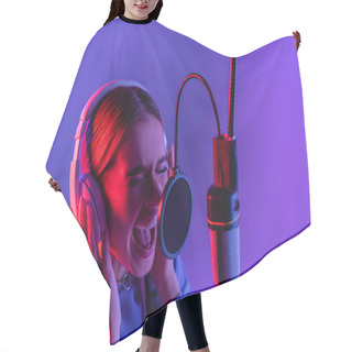 Personality  Woman In Wireless Headphones Recording Song While Singing In Microphone On Purple  Hair Cutting Cape