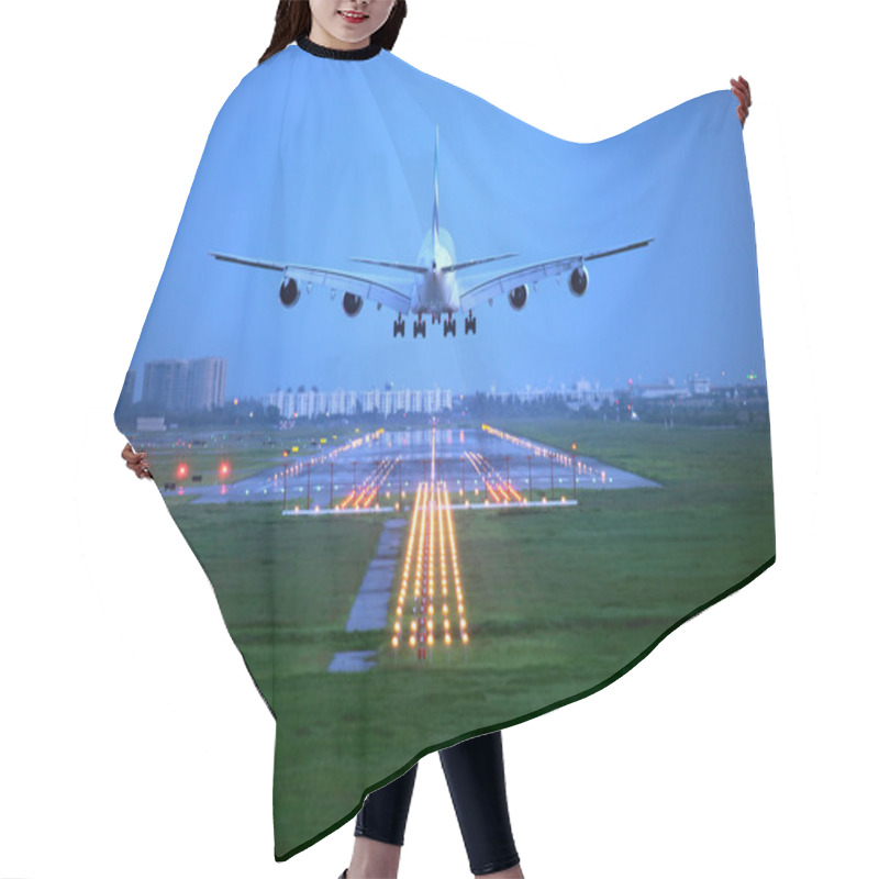 Personality  passenger plane fly up over take-off runway from airport hair cutting cape