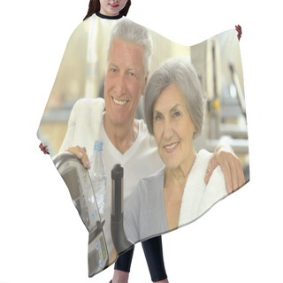 Personality  Senior Couple Exercising In Gym Hair Cutting Cape