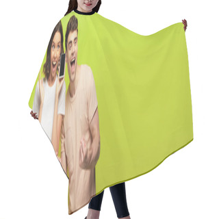 Personality  Panoramic Shot Of Happy Young Man Showing Yes Gesture While Standing Near Excited Girl On Green Background Hair Cutting Cape