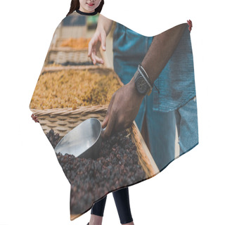 Personality  Cropped View Of African American Man Holding Metal Scoop With Raisins Near Woman Gesturing In Supermarket   Hair Cutting Cape