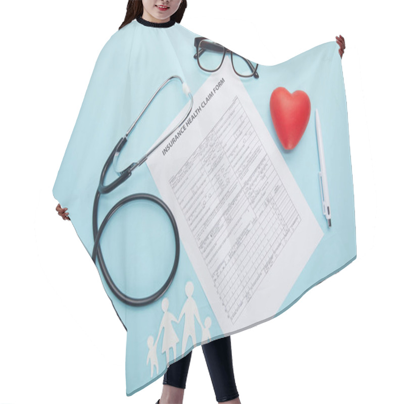Personality  Top View Of Insurance Health Claim Form, Eyeglasses, Paper Cut Family, Red Heart Symbol And Stethoscope On Blue  Hair Cutting Cape