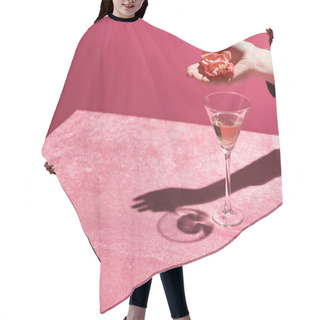Personality  Cropped View Of Woman Holding Rose Petals Above Glass Of Rose Wine On Velour Cloth Isolated On Pink, Girlish Concept  Hair Cutting Cape