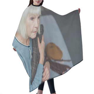 Personality  Sad Senior Woman Sitting On Bed, Looking Away And Holding Jacket At Home Hair Cutting Cape