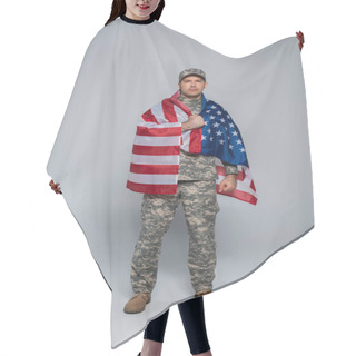 Personality  Full Length Of Patriotic Army Soldier In Camouflage Uniform Wrapped In Flag Of United States Of America During Memorial Day On Grey  Hair Cutting Cape