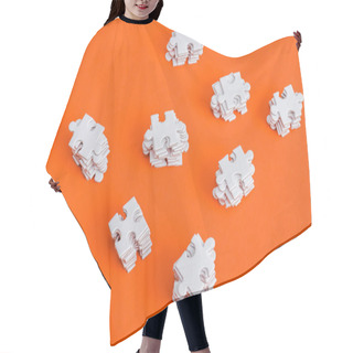 Personality  Top View Of Stacked White Puzzle Pieces On Orange Hair Cutting Cape