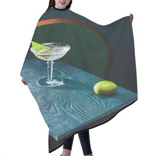 Personality  High Angle View Of Cocktail Glass With Mint Leaf And Whole Lime On Blue Wooden Surface On Geometric Background With Golden Circle Hair Cutting Cape