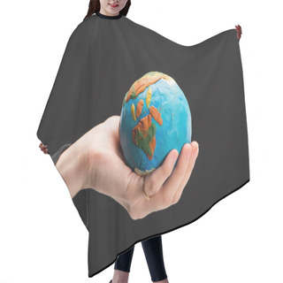 Personality  Partial View Of Plasticine Globe In Female Hand Isolated On Black, Global Warming Concept Hair Cutting Cape