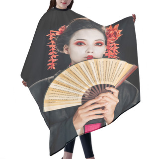 Personality  Young Geisha In Black Kimono With Red Flowers In Hair Holding Traditional Asian Hand Fan Isolated On Black Hair Cutting Cape