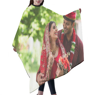 Personality  Happy Indian Married Couple In Traditional Wedding Clothes Looking At Each Other Outside Hair Cutting Cape