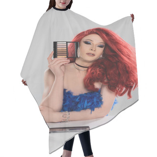 Personality  Drag Queen In Red Wig Holding Eye Shadows Palette Near Perfumes And Makeup Brushes Isolated On Grey   Hair Cutting Cape