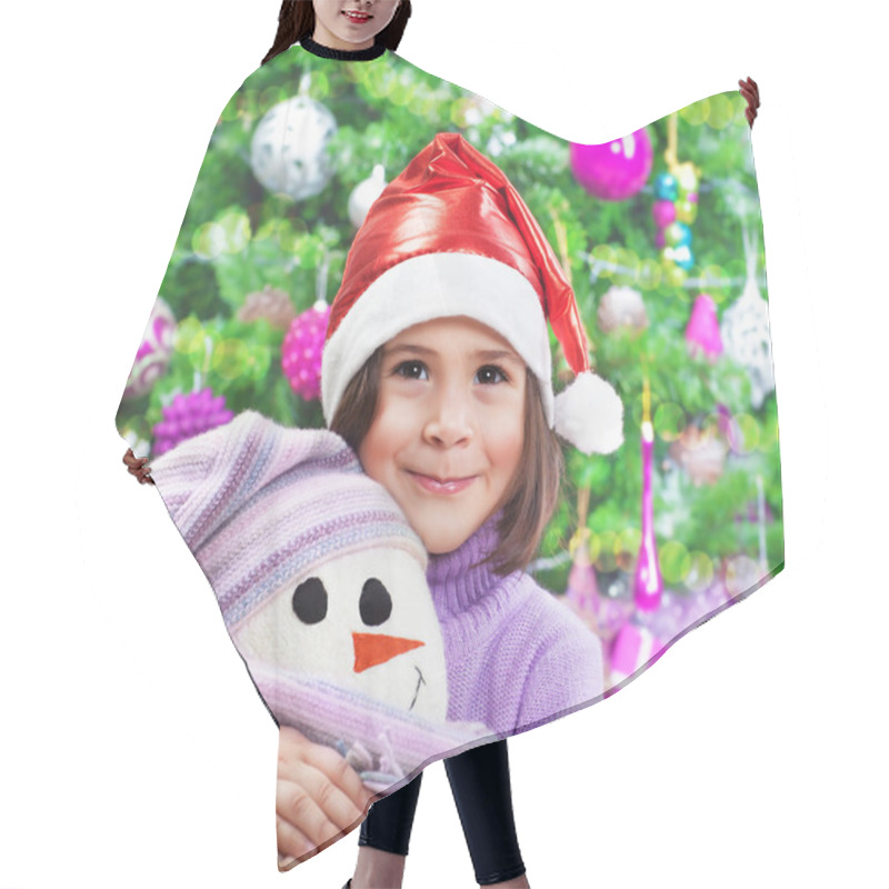 Personality  Little happy girl on Christmas party hair cutting cape