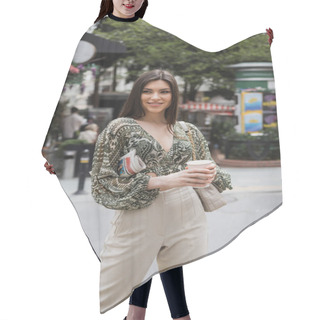 Personality  Beautiful Woman With Long Hair Holding Morning Coffee In Paper Cup And Newspaper While Standing In Trendy Outfit With Handbag And Smiling On Urban Street Near Blurred Flower Shop In Istanbul  Hair Cutting Cape