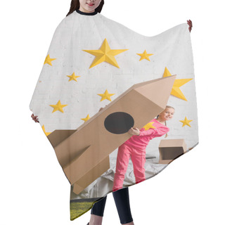 Personality  Full Length View Of Excited Kid Holding Big Cardboard Rocket In Bedroom Hair Cutting Cape