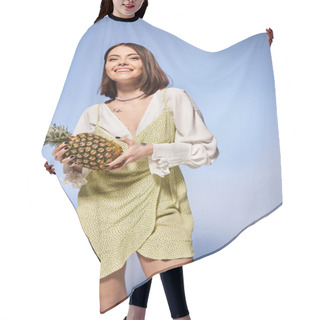 Personality  A Brunette Woman Gracefully Holding A Vibrant Pineapple In A Stylish Dress. Hair Cutting Cape