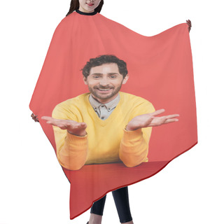 Personality  Carefree Man In Yellow Long Sleeve Jumper Gesturing On Red Coral Background  Hair Cutting Cape