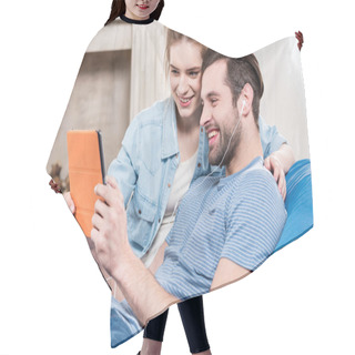 Personality  Couple Using Digital Tablet Hair Cutting Cape
