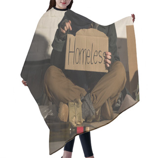 Personality  Cropped View Of Homeless Man Holding Piece Of Cardboard With 