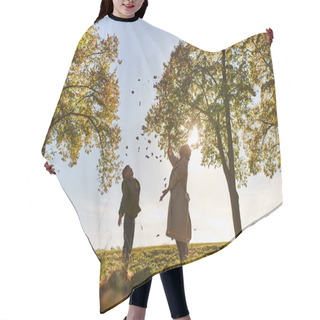 Personality  Silhouette Of Mother And Child Throwing Autumn Leaves, Park, Fall Season, Having Fun, Freedom Hair Cutting Cape
