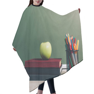 Personality  Ripe Apple On Books Near Pen Holder With School Supplies On Desk Near Green Chalkboard Hair Cutting Cape
