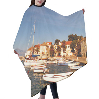 Personality  HVAR CROATIA 05 19 2000: Hvar Is A Croatian Island In The Adriatic Sea, Located Off The Dalmatian Coast, Lying Between The Islands Of Brac, VIs And Korcula. Hair Cutting Cape