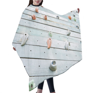 Personality  Grunge Surface Of An Artificial Rock Climbing Wall With Toe And  Hair Cutting Cape