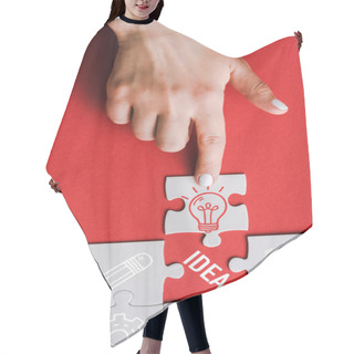 Personality  Top View Of Woman Pointing With Finger At Jigsaw With Light Bulb Near Connected White Puzzle Pieces And Idea Lettering On Red Hair Cutting Cape