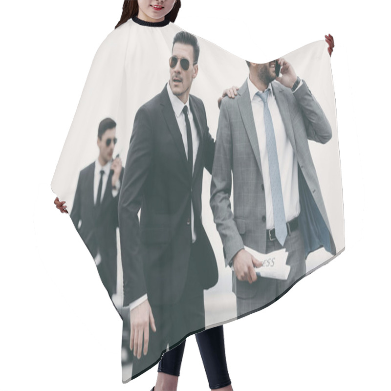 Personality  Businessman Walking With Two Bodyguards And Talking By Smartphone  Hair Cutting Cape