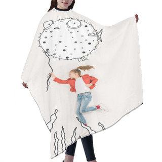 Personality  Top View Of Cheerful Child Holding Puffer Fish And Smiling On White  Hair Cutting Cape