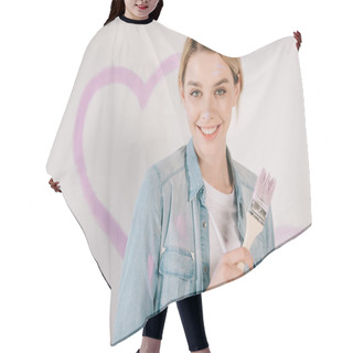 Personality  Happy Young Woman Smiling At Camera While Holding Pink Paintbrush Hair Cutting Cape