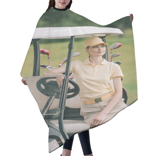 Personality  Portrait Of Smiling Woman In Polo And Cap Sitting On Golf Cart And Looking Away Hair Cutting Cape