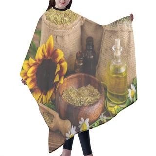 Personality  Wooden Bowl, Spatula, Sackcloth Bags With Dried Herbs, Bottles With Essential Oils, Sunflower And Chamomile Flowers On Wooden Surface  Hair Cutting Cape