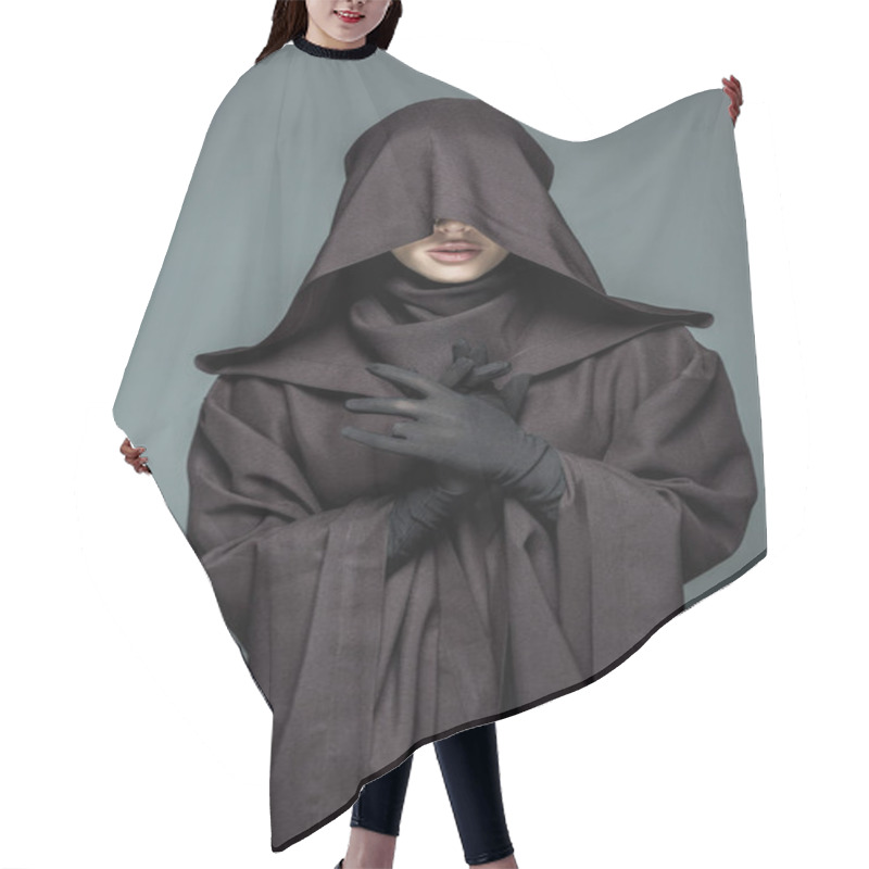 Personality  front view of woman in death costume gesturing isolated on grey hair cutting cape