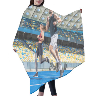 Personality  Motion Shot Of Young Male And Female Joggers Running On Track At Sports Stadium Hair Cutting Cape