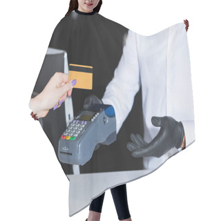 Personality  Cropped View Of Receptionist In Latex Gloves Holding Payment Terminal Near Tourist With Credit Card  Hair Cutting Cape